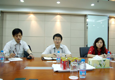 Mr. Zhang (center) and Mr. Tang (right) reporting for China