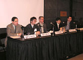 Panelists on the podium