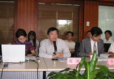Xiao-Ping Gao (center) and Mr. Zhang Yujie (right)